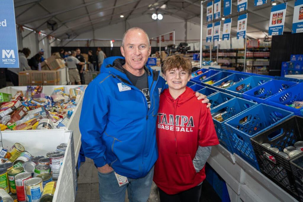 Rob and Keland Lamke in the Metropolitan Ministries Holiday Tent
